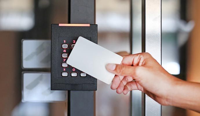 Person using access card for secure entry
