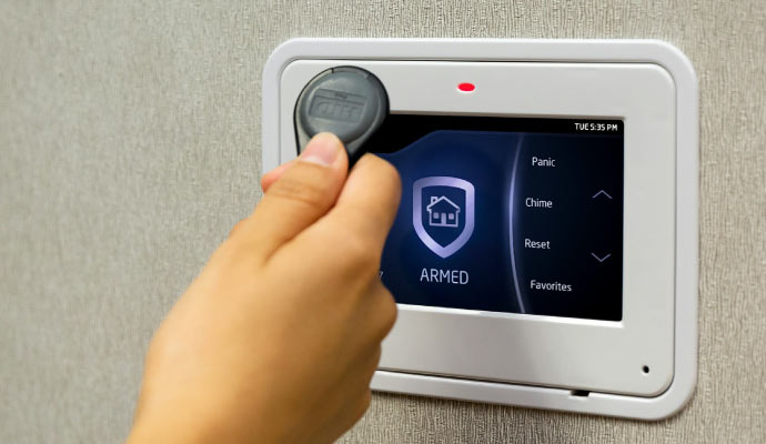 A person using DMP virtual keypad app