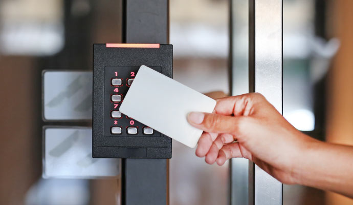 A person using card access control system.