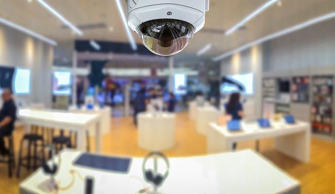 An installed business security camera in commercial area