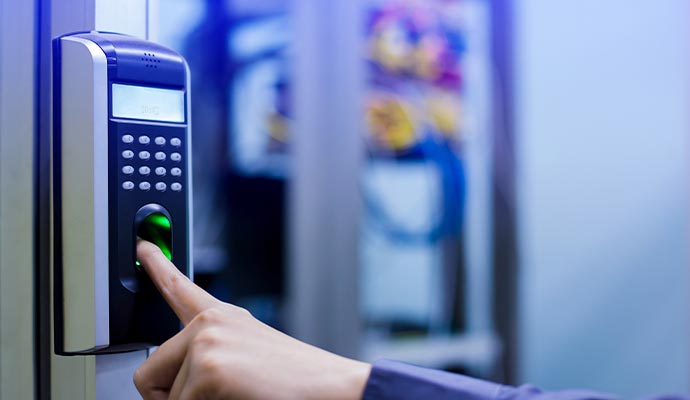 User pointing finger on biometric system